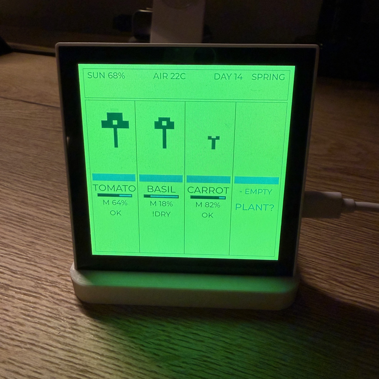 Pixel-art plant-health monitor on an ESP32 panel